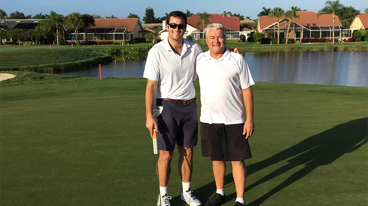 Dan and his Dad playing golf
