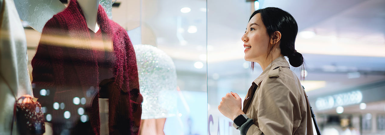 A girl holding bag while shopping