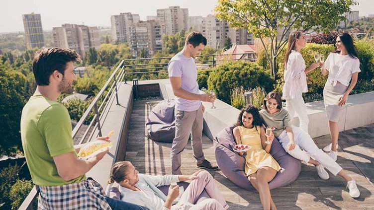 People enjoying an office rooftop