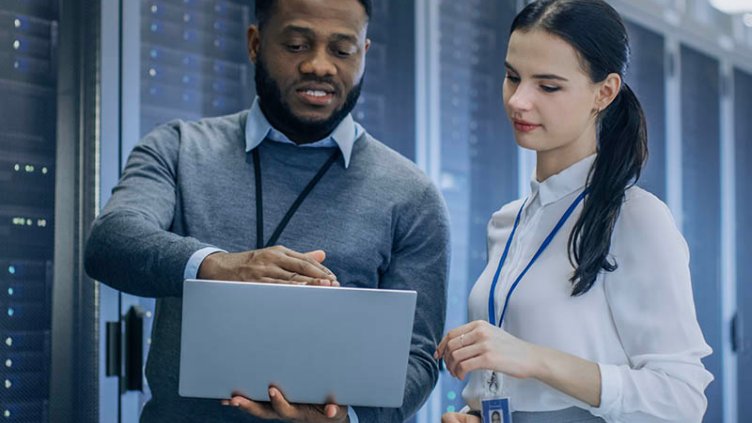 Two Employees are discussing about Data Center