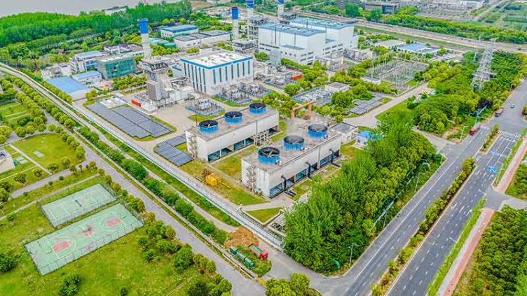 Aerial view of a large industrial plant showcasing extensive facilities and machinery in a sprawling layout.