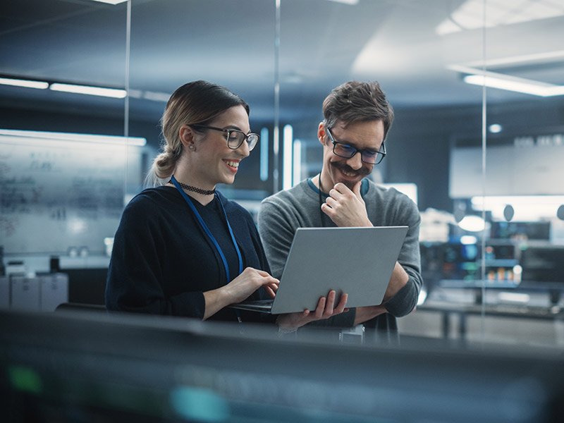 Employees looking at technology