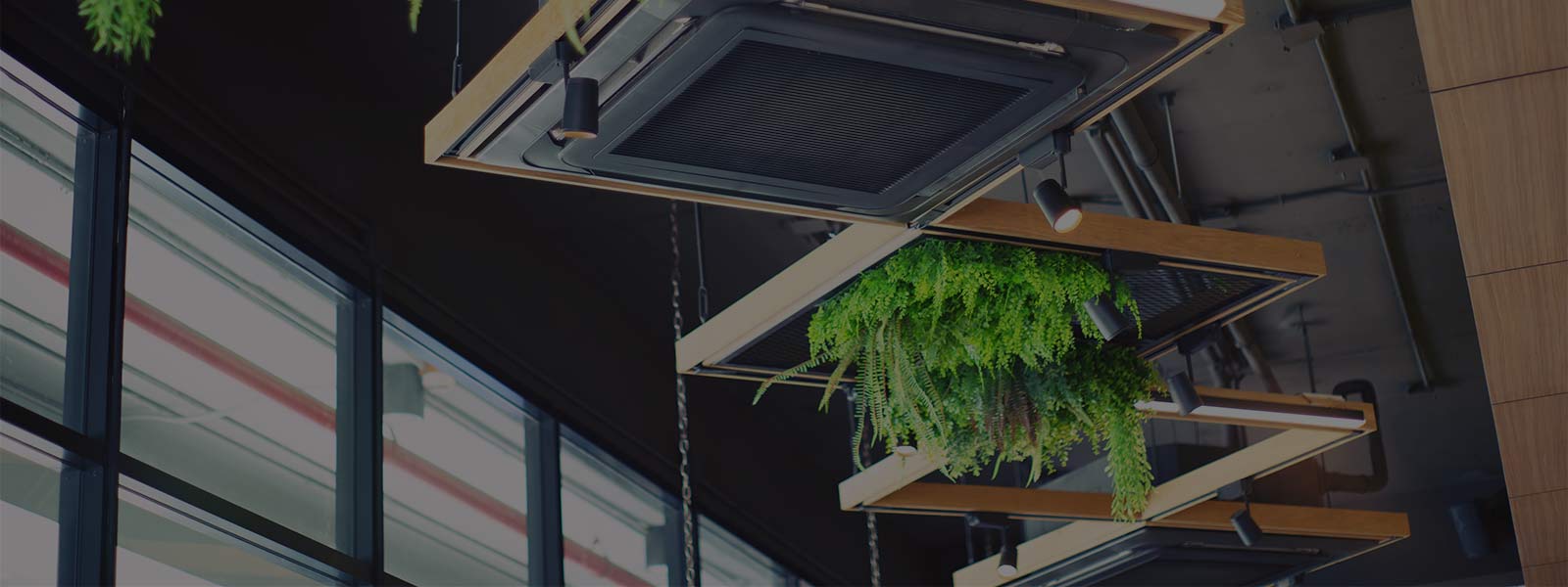 Image of modern office air conditioning units with greenery